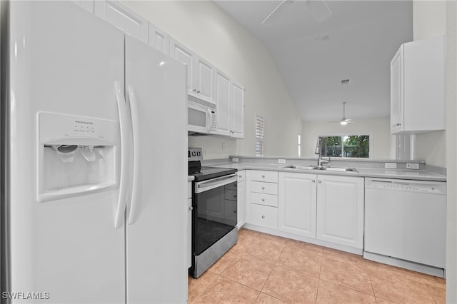 kitchen with white cabinetry, sink, lofted ceiling, white appliances, and light tile patterned flooring