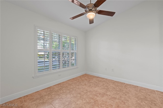 spare room with ceiling fan