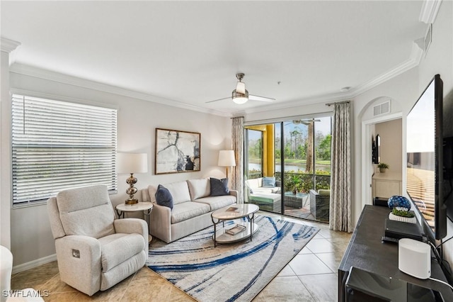 tiled living room featuring crown molding and ceiling fan