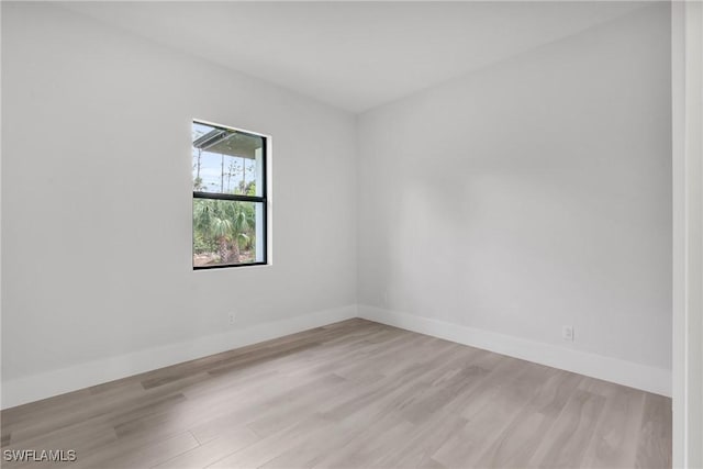 unfurnished room featuring light wood-type flooring