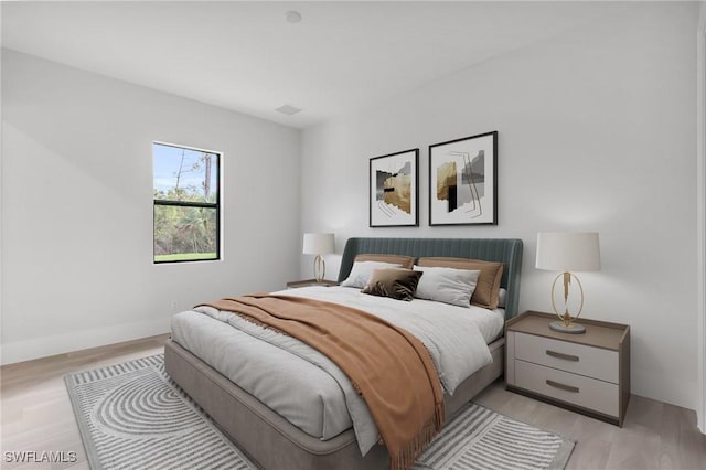 bedroom featuring light hardwood / wood-style floors