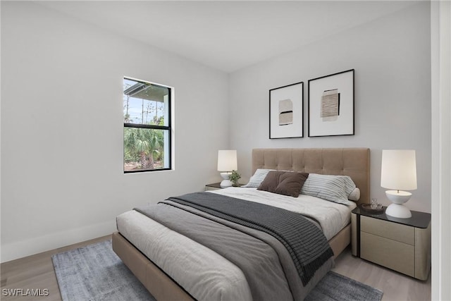 4751 1st Ave SW, Naples, FL 34119 - bedroom featuring light wood-type flooring and baseboards