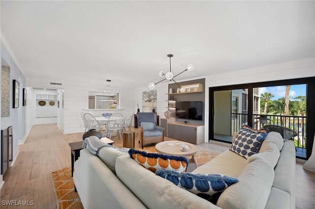 living room with light hardwood / wood-style flooring