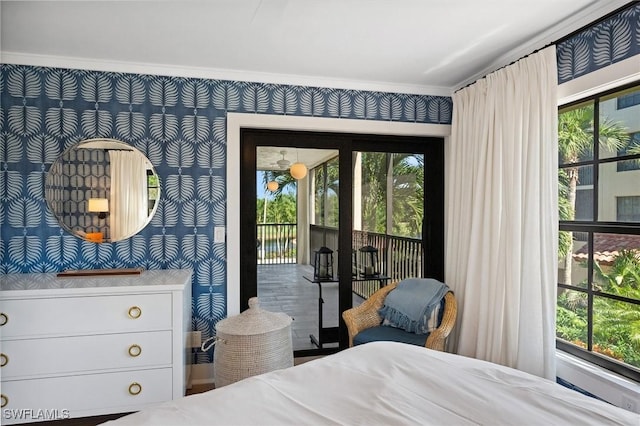 bedroom featuring access to outside and ornamental molding