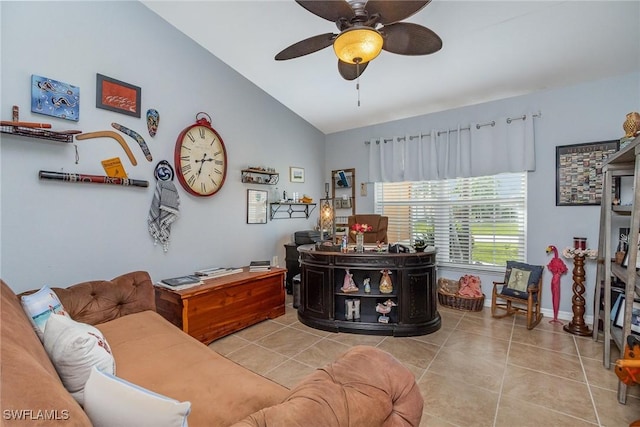 office featuring ceiling fan, light tile patterned floors, and lofted ceiling