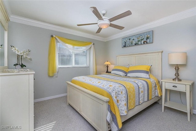 bedroom featuring light carpet, ceiling fan, and crown molding