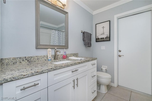 bathroom with tile patterned floors, vanity, toilet, and crown molding