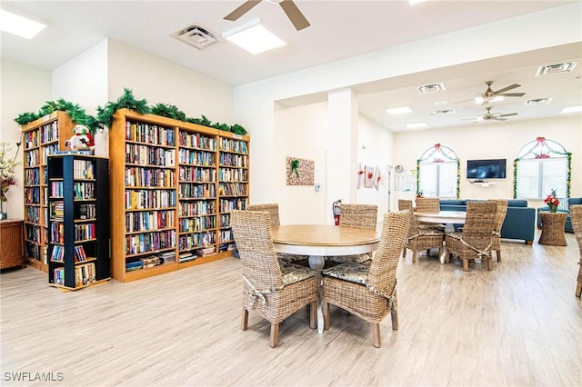 dining room with light wood-type flooring