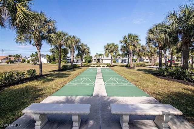 view of community featuring a lawn