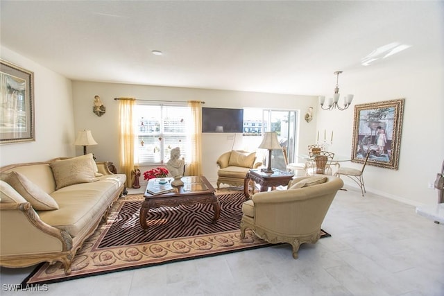 living room with a notable chandelier