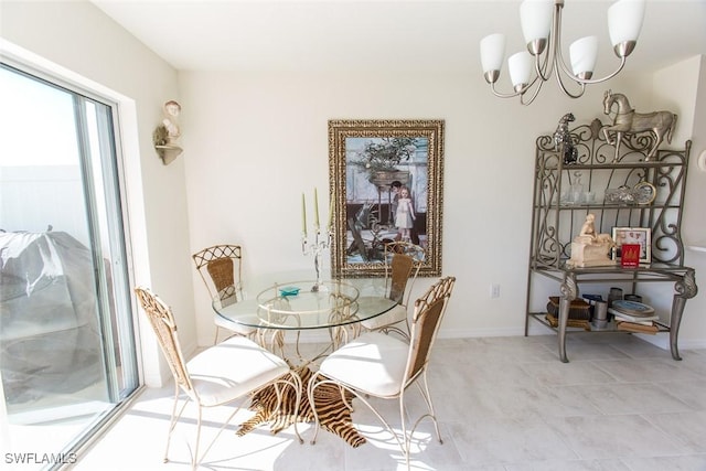 dining room with a chandelier