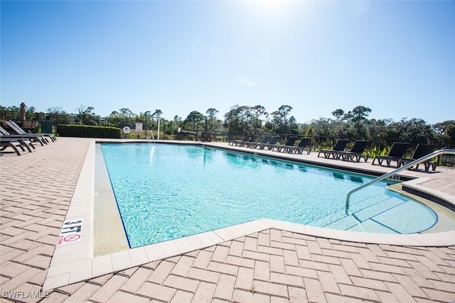 view of pool featuring a patio