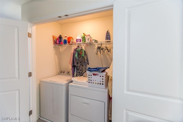 laundry area featuring separate washer and dryer