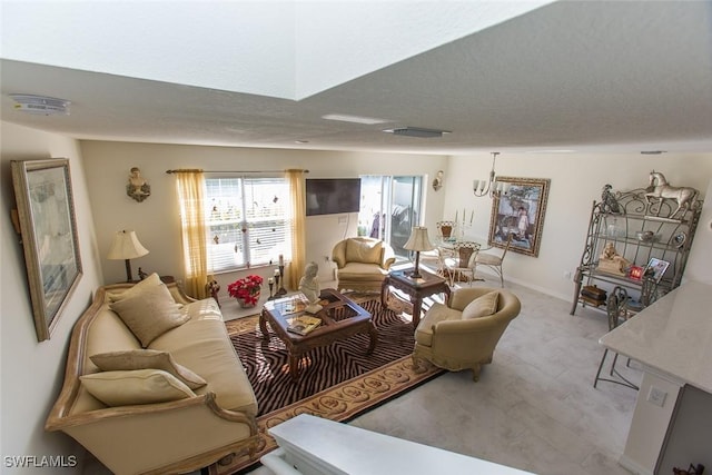 living room featuring a textured ceiling