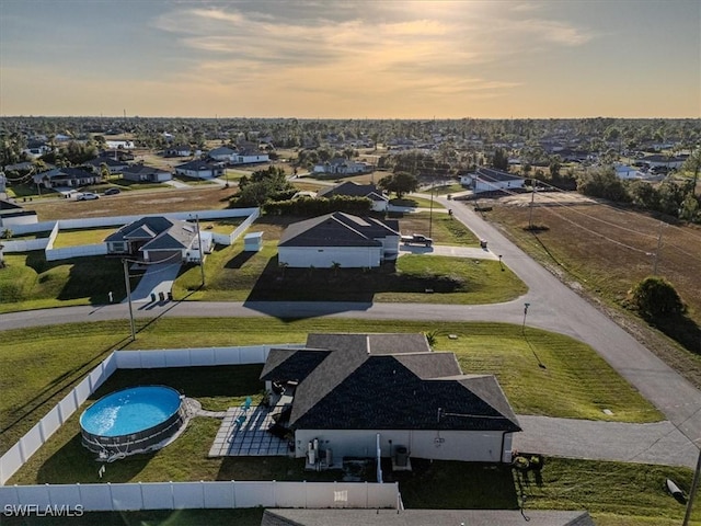 view of aerial view at dusk