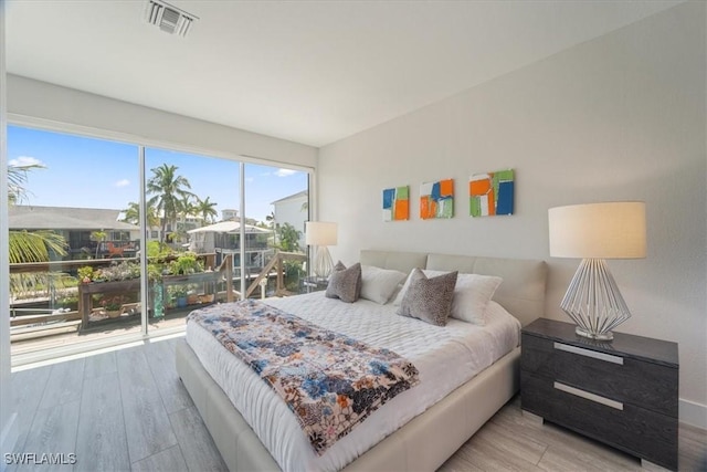 bedroom featuring light hardwood / wood-style flooring