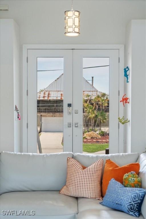 doorway to outside featuring french doors and a healthy amount of sunlight