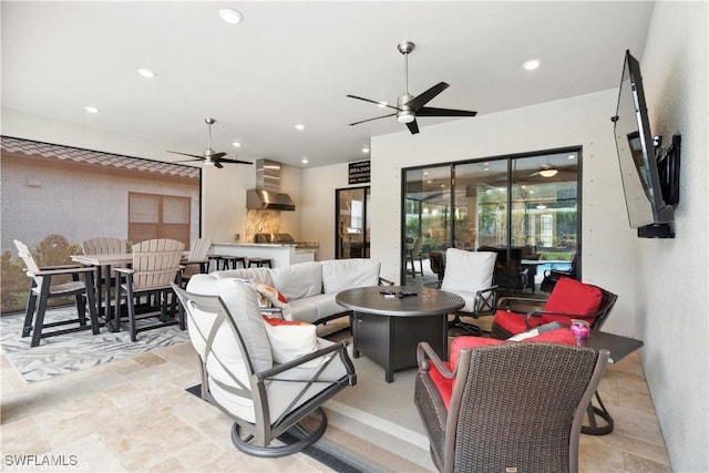 living room featuring ceiling fan