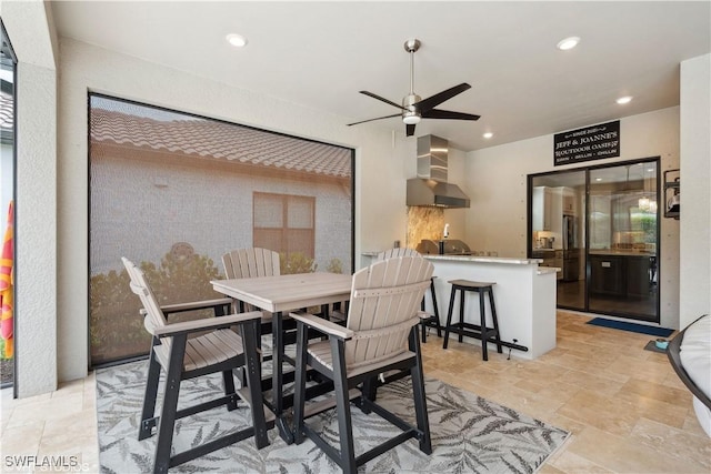 dining area with ceiling fan