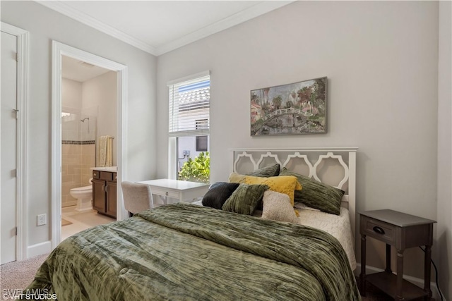 bedroom featuring light carpet, ensuite bathroom, and crown molding