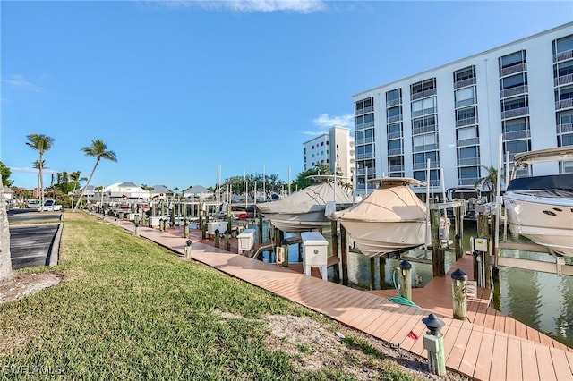 view of dock with a water view and boat lift