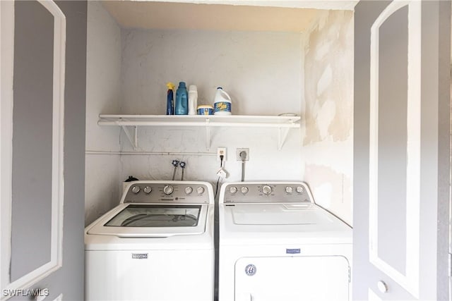 laundry area featuring separate washer and dryer