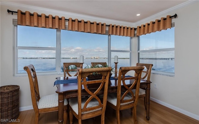 sunroom with a water view