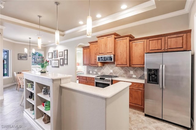 kitchen with hanging light fixtures, light tile patterned floors, backsplash, a kitchen island, and appliances with stainless steel finishes