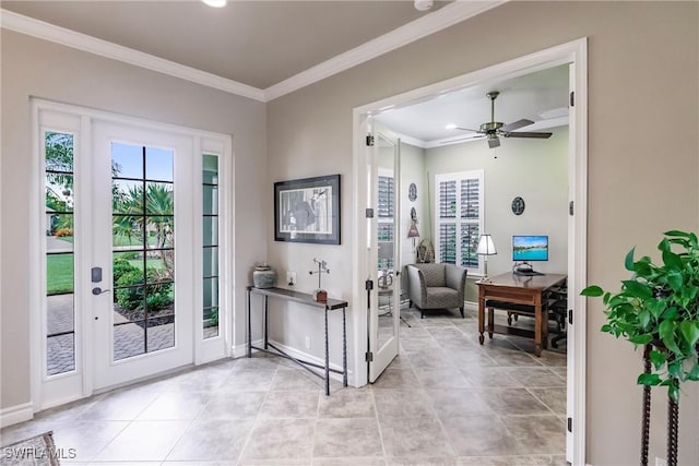 foyer entrance with ceiling fan, light tile patterned floors, crown molding, and french doors