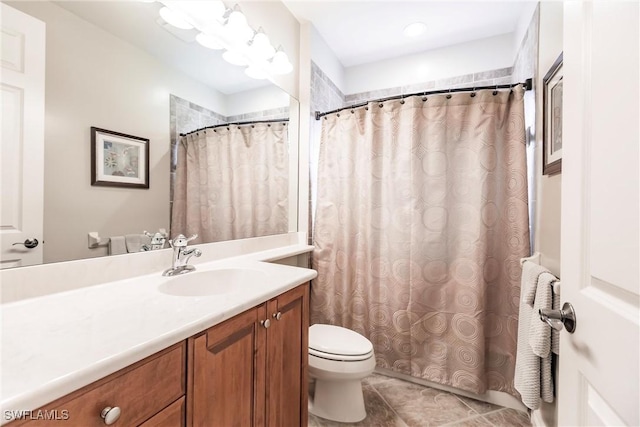 bathroom featuring tile patterned flooring, vanity, toilet, and a shower with shower curtain