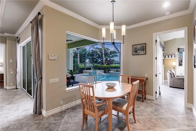 dining room featuring a chandelier and ornamental molding