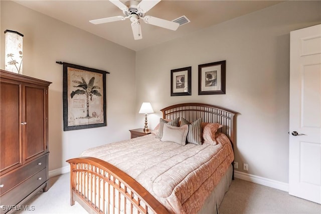 bedroom featuring ceiling fan and light colored carpet