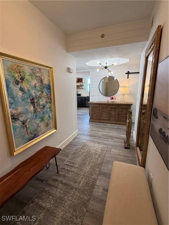 corridor featuring dark hardwood / wood-style floors