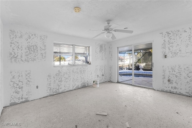 empty room featuring ceiling fan