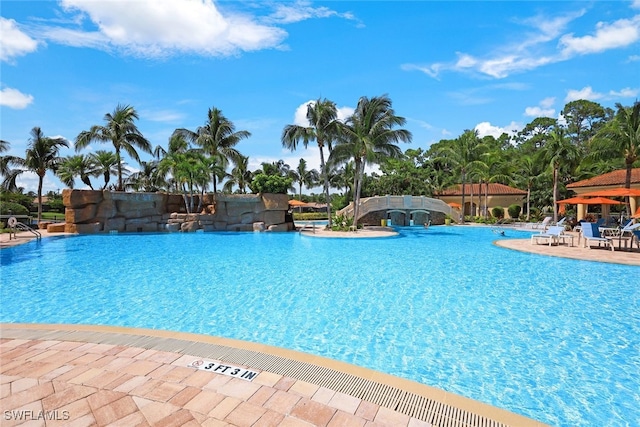 view of swimming pool with a patio area