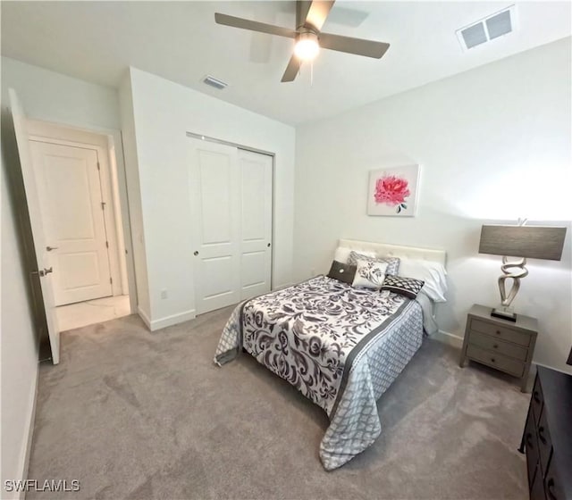 12830 Hawkins Dr, Estero, FL 33928 - bedroom with carpet floors, a closet, and a ceiling fan