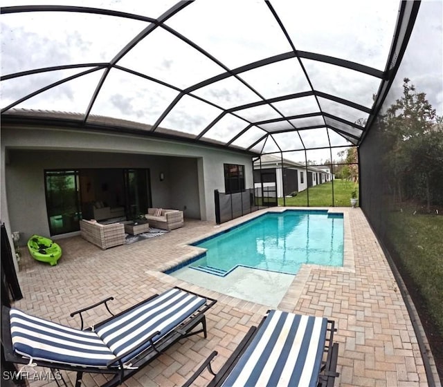 12830 Hawkins Dr, Estero, FL 33928 - swimming pool featuring outdoor lounge area, a patio, and a lanai