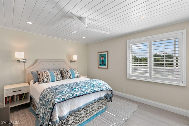 bedroom featuring ceiling fan and light hardwood / wood-style floors