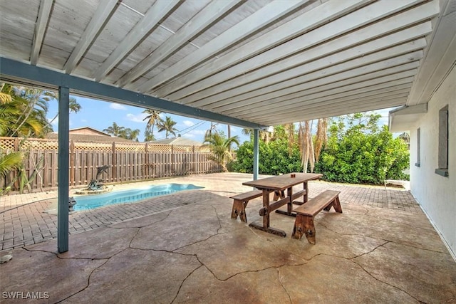 view of patio featuring a fenced in pool