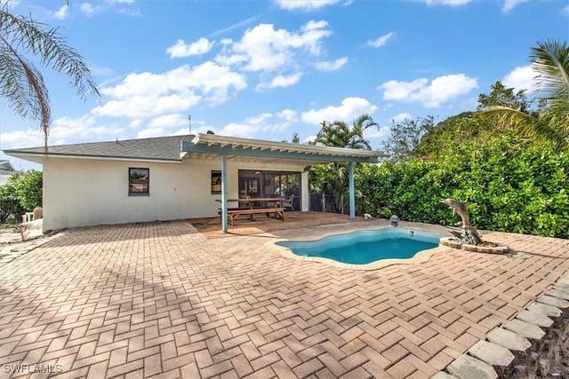 view of pool featuring a pergola and a patio area