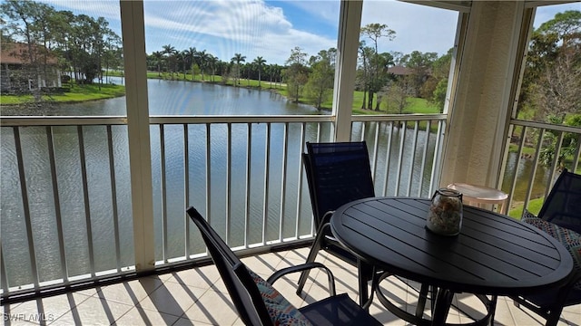 balcony featuring a water view