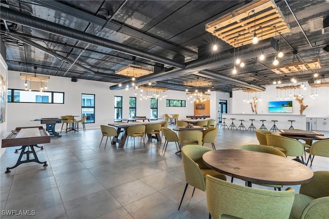 interior space featuring a towering ceiling