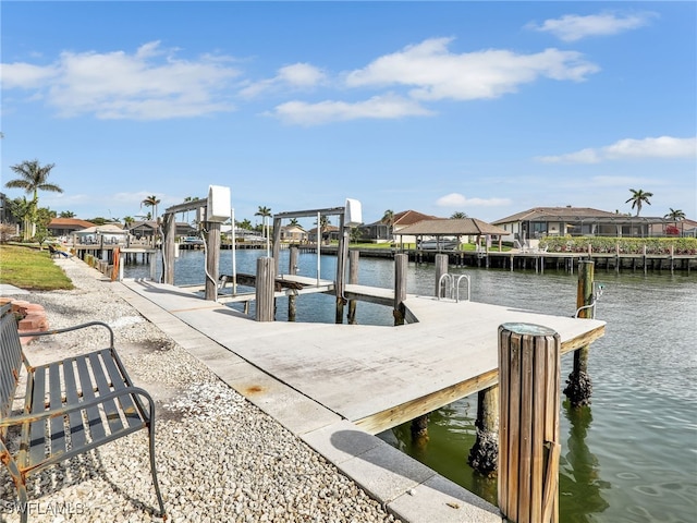 view of dock with a water view