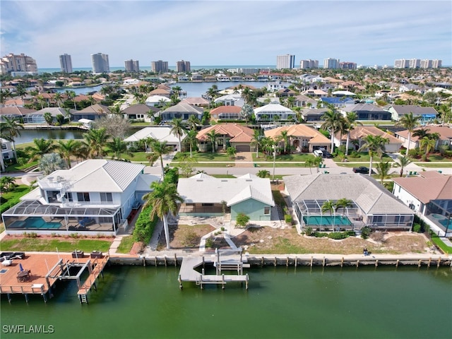 drone / aerial view with a water view