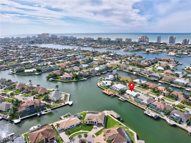 bird's eye view with a water view