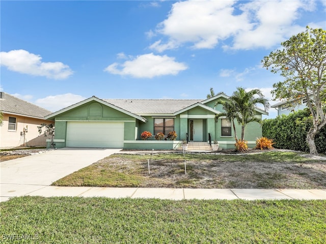 ranch-style home with a garage and a front yard