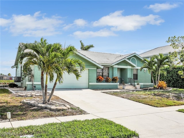 view of front of property with a garage