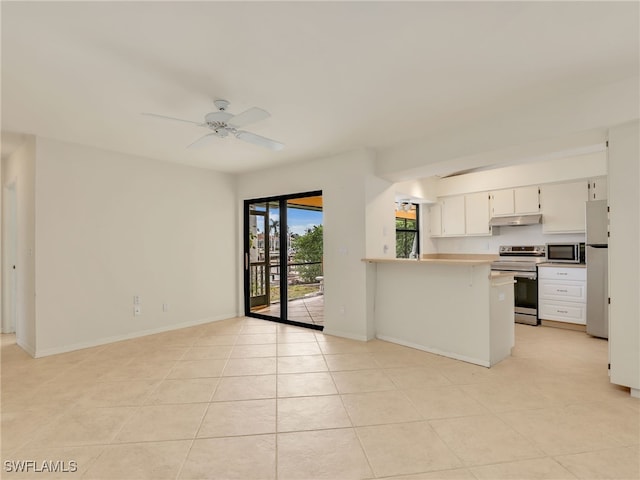 kitchen featuring light tile patterned floors, ceiling fan, stainless steel appliances, white cabinets, and kitchen peninsula