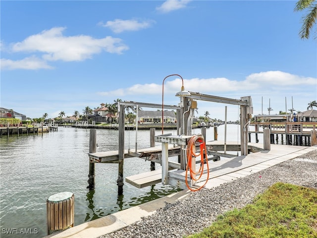 dock area with a water view