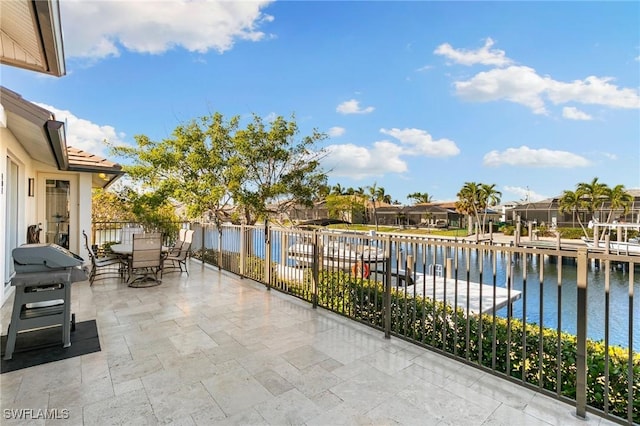 view of patio / terrace with a water view